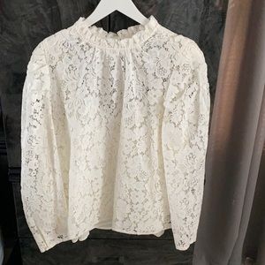 White blouse with slip.